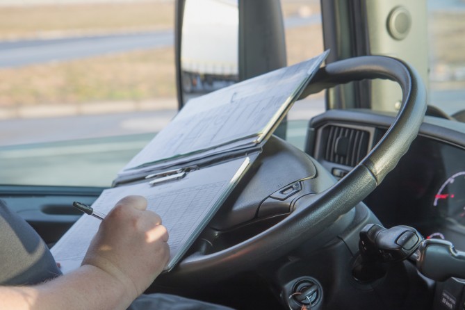 Truck Driver with Paperwork